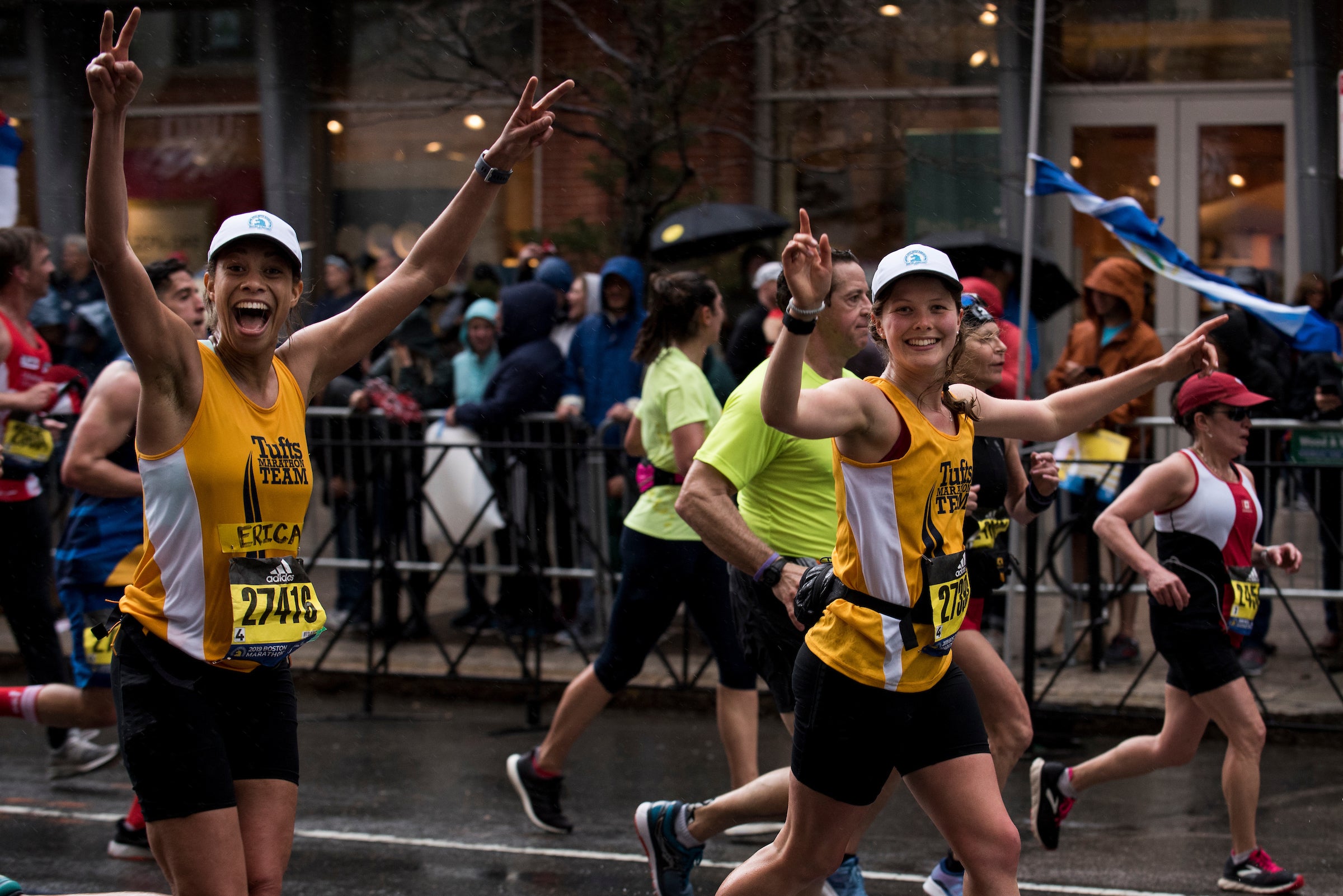 Erica Robles, A19 and Megan Kuhnle, A19, on the stretch of Boylston Ave to the finish line (Alonso Nichols/Tufts)