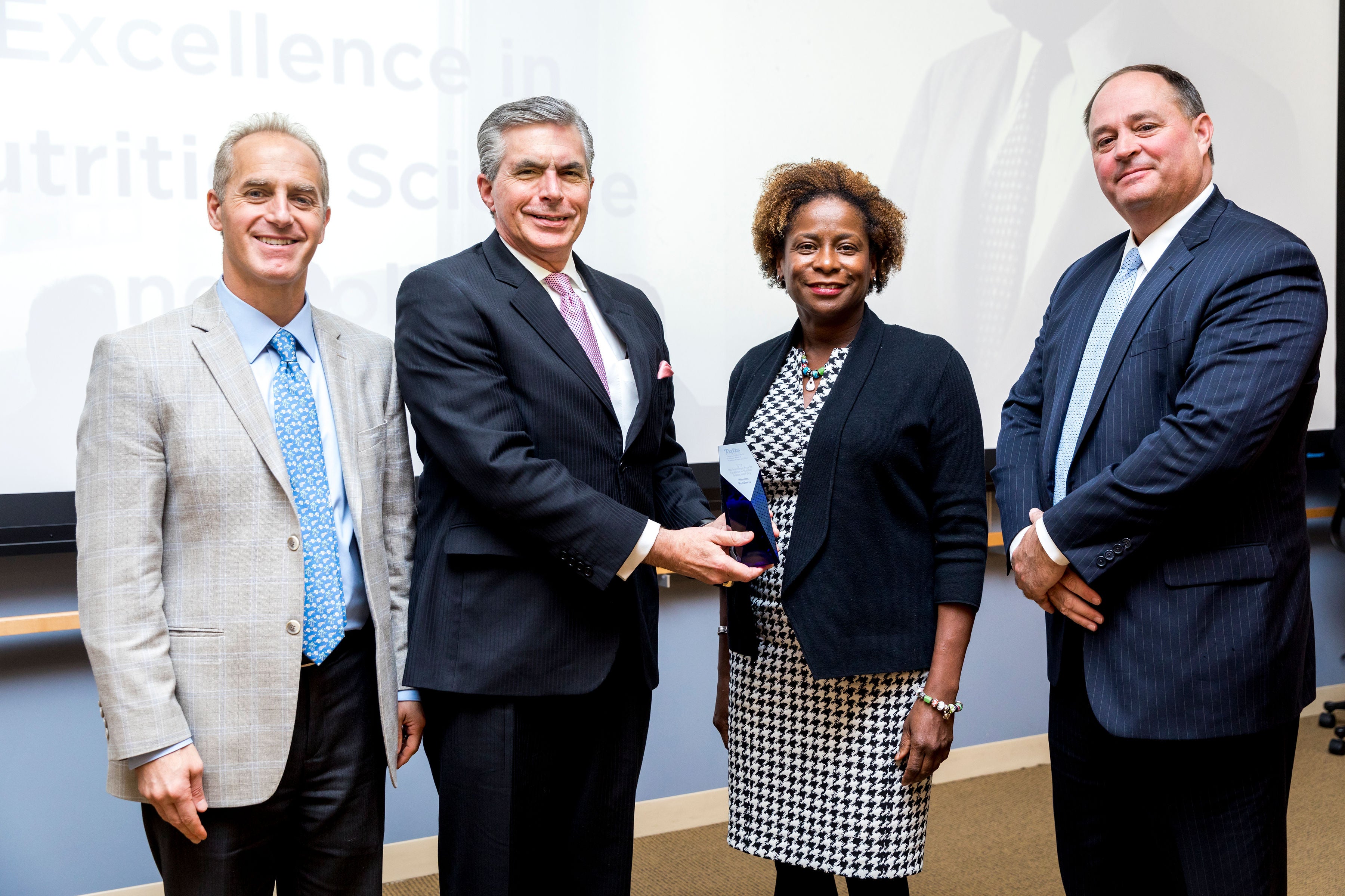 Jean Mayer Prize recipients from Mission: Readiness with Friedman Dean Dariush Mozaffarian and John Hancock CEO Brooks Tingle